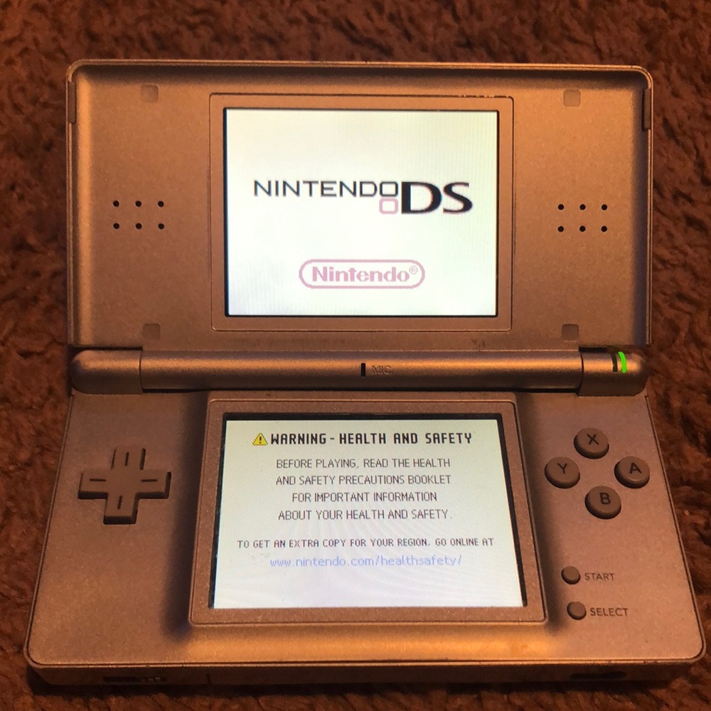 NintendoDS, charger, backpack case, 22 games included
